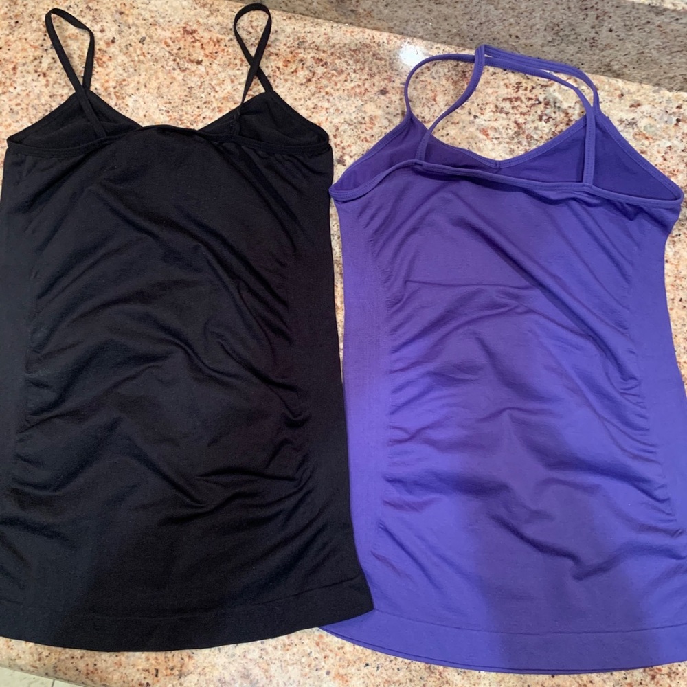 2 Unity woman’s tanks
